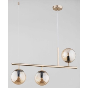 Złota nowoczesna lampa wisząca pozioma rurka z bursztynowymi kloszami Abakus Alfa 63036 3xE14 88cm x 71cm